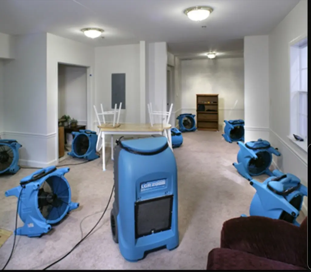 Air movers and dehumidifier setup for Water Extraction & Removal in Raymondville
